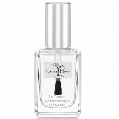 A clear glass bottle of KarmalHues fragrance with a reflective silver cap and a white label featuring a black brush and tree logo, set against a plain white background.